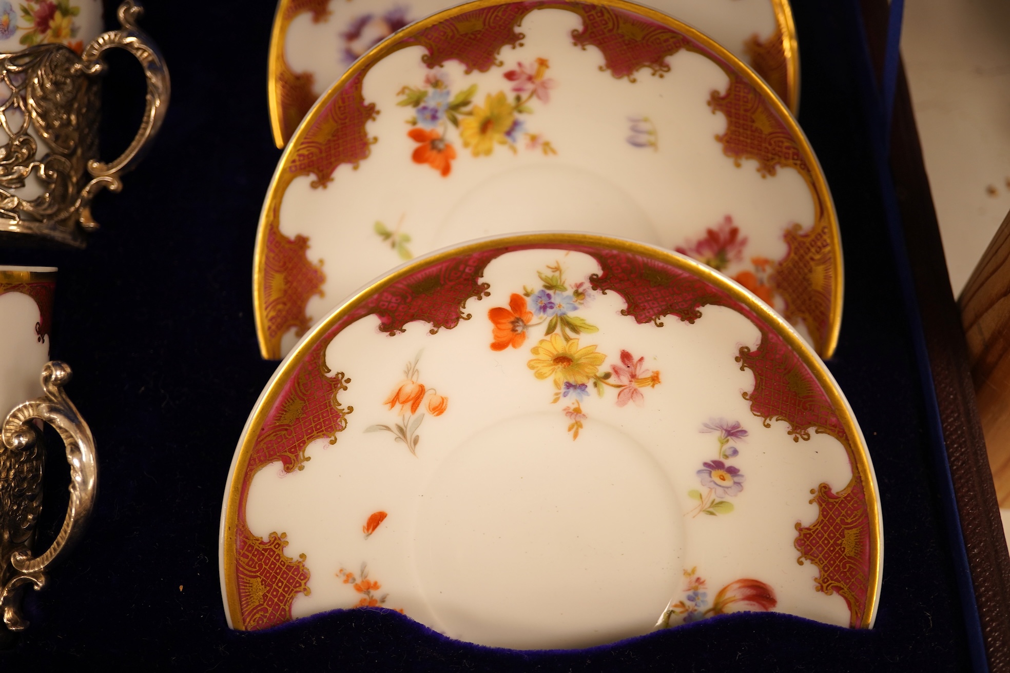 A cased Wurttemberg porcelain coffee set, silver mounted, 40cm wide